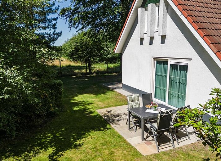 Open kitchen and dining area of Cottage in Exloo, ideal for families in Exloo, Southeast Drenthe, Drenthe.