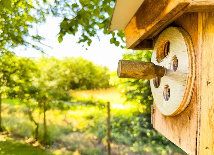 Covered table in the kitchen of Huisje in Exloo, attractive vacation home in Exloo, Southeast Drenthe, Drenthe.