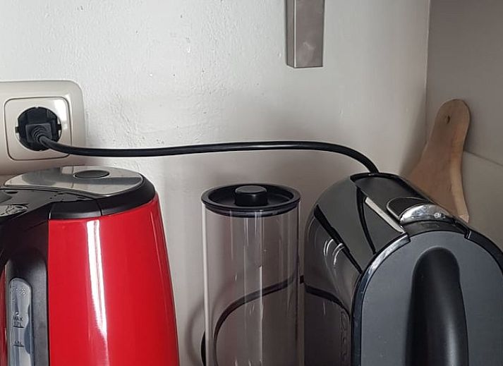 Gemuetliches Wohnzimmer in Cottage in Exloo, Ferienhaus in Drenthe mit komfortabler Sitzecke.