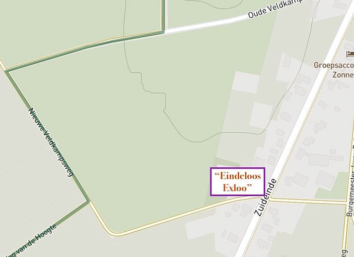 Eetruimte in Vakantiehuis in Exloo, Zuidoost Drenthe met houten tafel en stoelen in een gezellige setting.