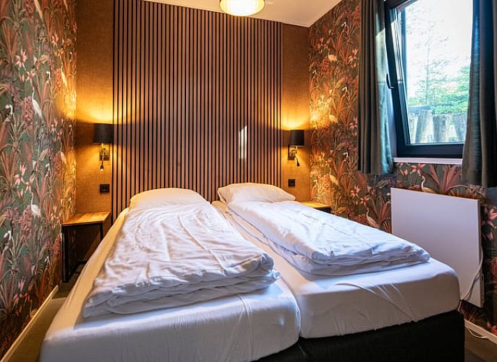 Cozy living room in Holiday Home in Dalerveen, Southeast Drenthe overlooking green nature.