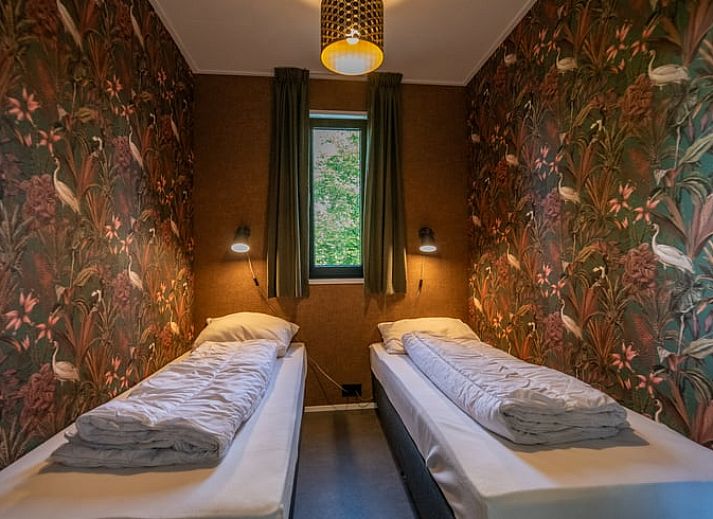 Cozy living room in Holiday Home in Dalerveen, Southeast Drenthe overlooking green nature.