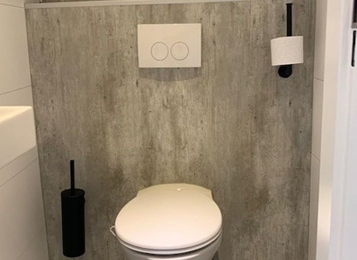 Cozy living room in Holiday Home in Dalerveen, Southeast Drenthe overlooking green nature.