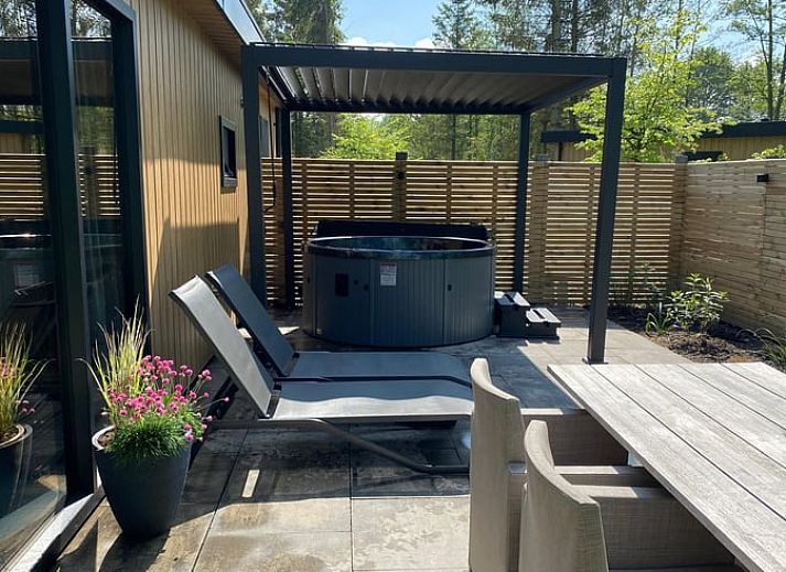 Dining and sitting area in Holiday home in Dalerveen, Southeast Drenthe, perfect for family gatherings.