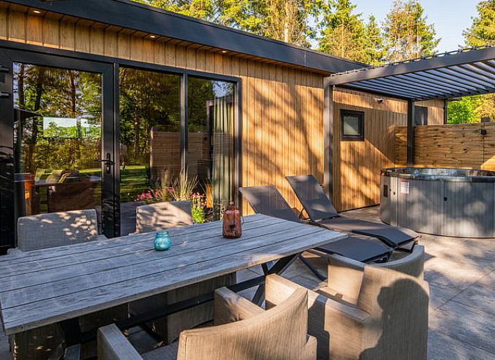 Dining and sitting area in Holiday home in Dalerveen, Southeast Drenthe, perfect for family gatherings.