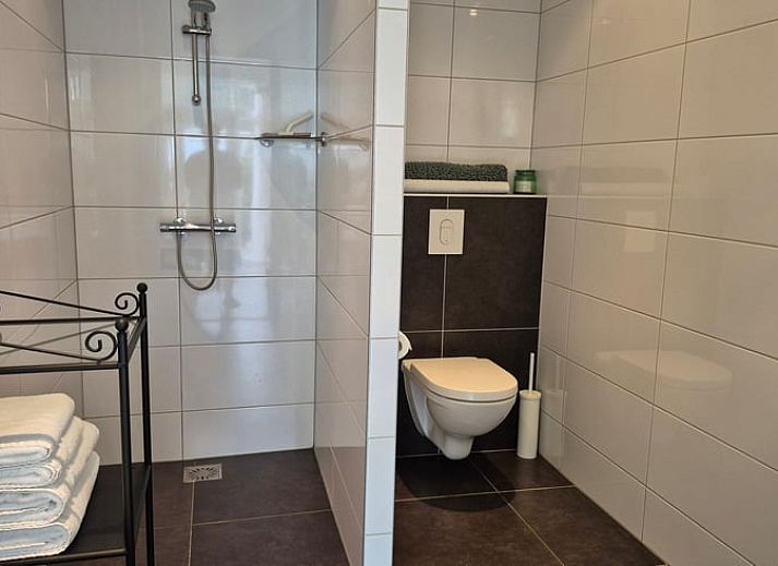 Vacation cottage in Dalerveen, a charming cottage in Southeast Drenthe, surrounded by green hedges and peaceful surroundings.