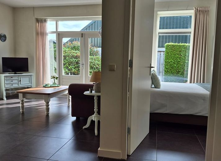 Attractive bedroom in Holiday Home in Dalerveen, Southeast Drenthe, with views of green surroundings and stylish furnishings.