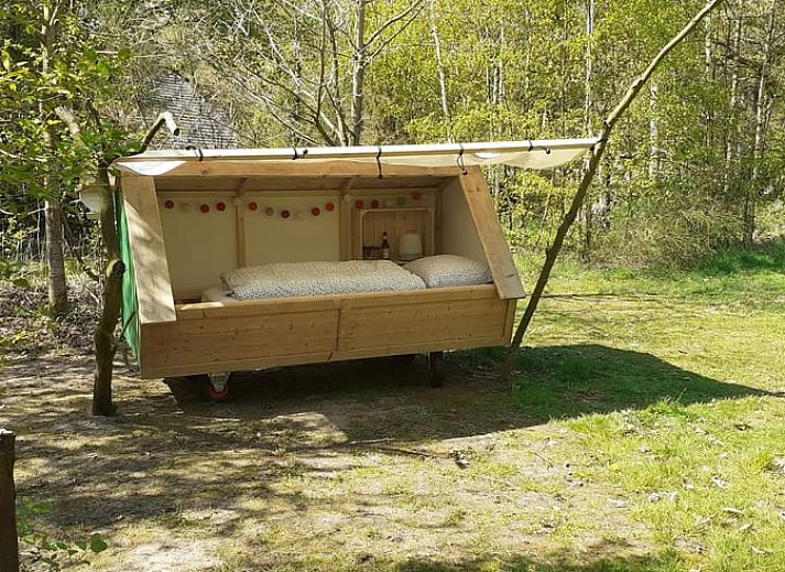 Unique wooden bed in Holiday home in Emmen, surrounded by nature in Southeast Drenthe.