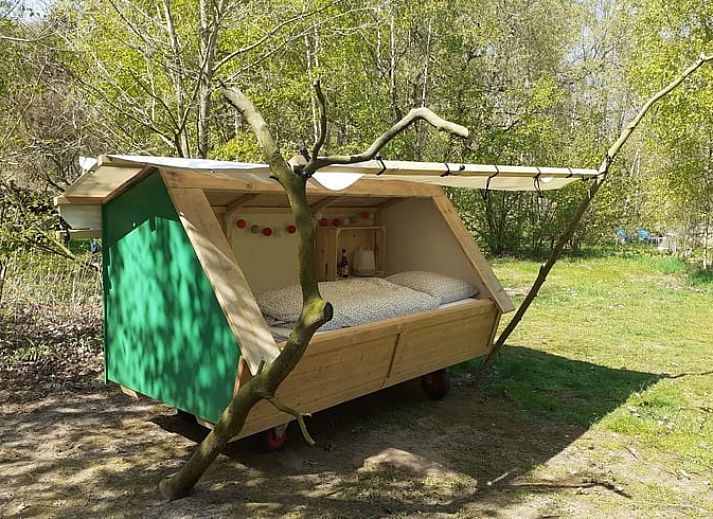 Unique wooden bed in Holiday home in Emmen, surrounded by nature in Southeast Drenthe.