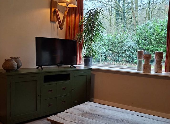 Ferienhaus in Schoonoord mit grosser Veranda, umgeben von gruener Natur in Suedost-Drenthe, ideal fuer einen erholsamen Aufenthalt.