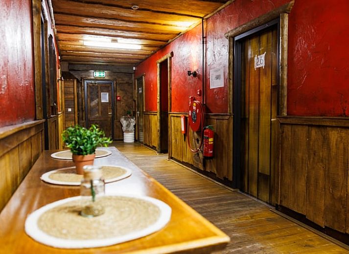Cottage in Erm, cottage with rustic wooden porch in Southeast Drenthe, surrounded by natural beauty and serene surroundings.