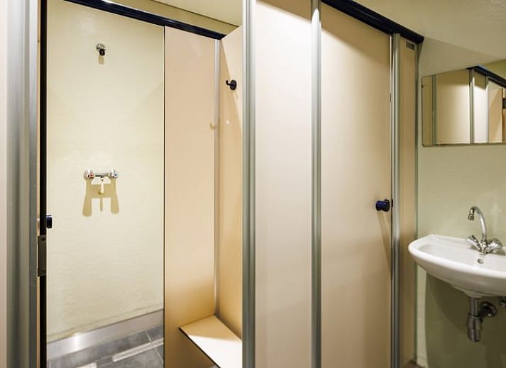 Cottage in Erm, cottage with rustic wooden porch in Southeast Drenthe, surrounded by natural beauty and serene surroundings.