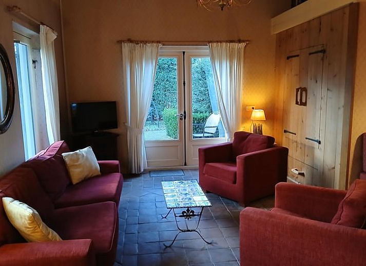 Relax on the terrace of Holiday Home in Stieltjeskanaal, Southeast Drenthe. Enjoy the green surroundings and tranquility of this charming vacation home.