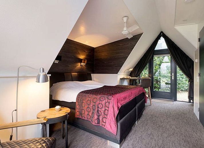 Charmantes Ferienhaus Cottage in Stieltjeskanaal, Suedost-Drenthe mit gemuetlicher Veranda und gruenem Garten.