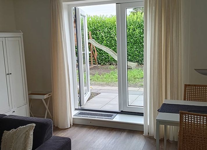 Covered porch at Cottage in Emmer-Compascuum, vacation home in Southeast Drenthe, Drenthe.