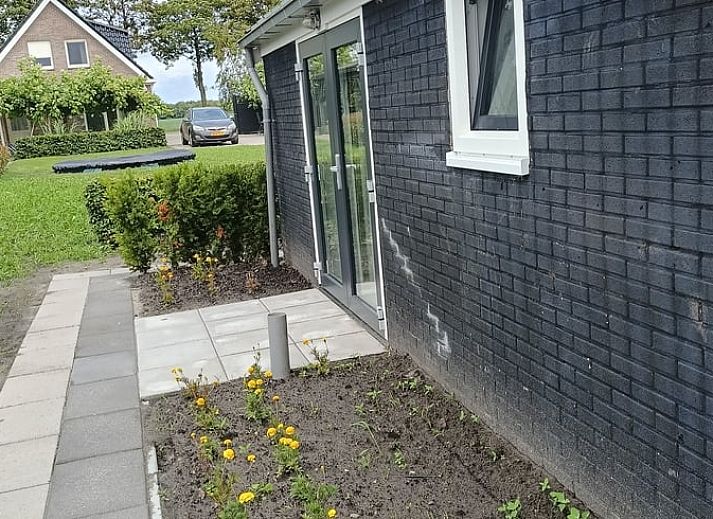 Covered porch at Cottage in Emmer-Compascuum, vacation home in Southeast Drenthe, Drenthe.