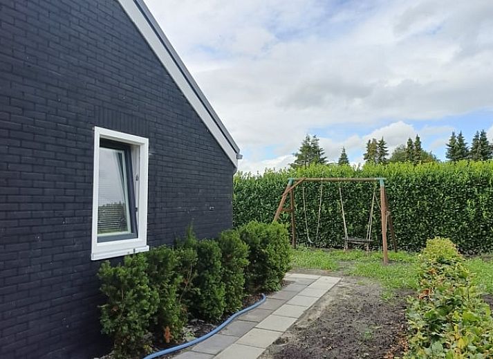 Covered porch at Cottage in Emmer-Compascuum, vacation home in Southeast Drenthe, Drenthe.