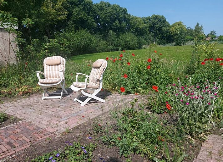 Gemuetliche Sitzecke im Ferienhaus in Zwinderen, ideal fuer Familienurlaub in Sued-Ost-Drenthe.
