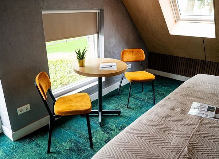 Luxury bedroom in Cottage in Fluitenberg, vacation home in Southwest Drenthe with comfortable double bed and stylish interior.