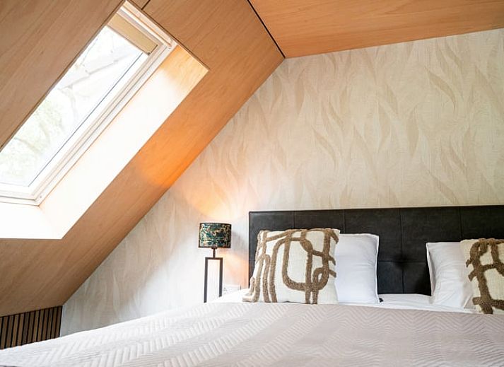 Luxury bedroom in Cottage in Fluitenberg, vacation home in Southwest Drenthe with comfortable double bed and stylish interior.