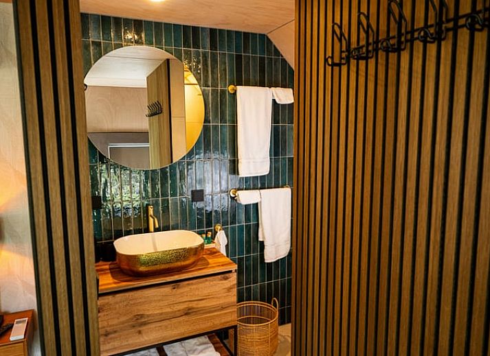 Luxury bedroom in Cottage in Fluitenberg, vacation home in Southwest Drenthe with comfortable double bed and stylish interior.