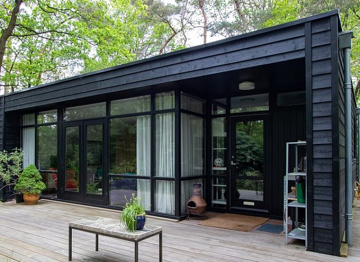 Cozy living room of Holiday Home in Doldersum, Southwest Drenthe, with modern kitchen and cozy interior for a relaxing stay.