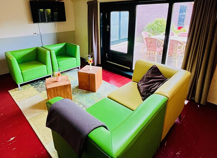 Komfortables Schlafzimmer im Ferienhaus DG1706, Havelte, Drenthe mit gemuetlicher Einrichtung.