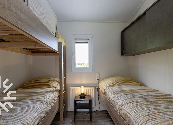 Ruhige Umgebung mit weidenden Pferden beim Ferienhaus DG1468 in Havelte, Drenthe.