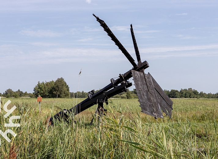 Stilvolles Schlafzimmer im Ferienhaus DG1450 Havelte, Drenthe, mit offenem Kleiderstaender.