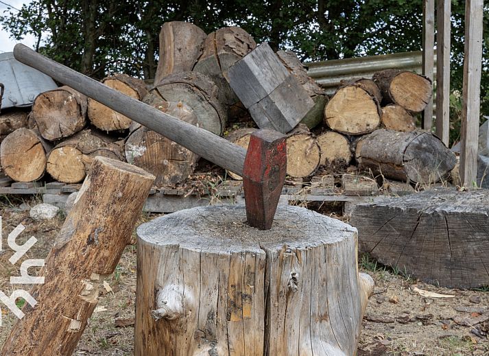 Spielecke im Ferienhaus DG053, Diever mit Spielen und Hochstuhl.