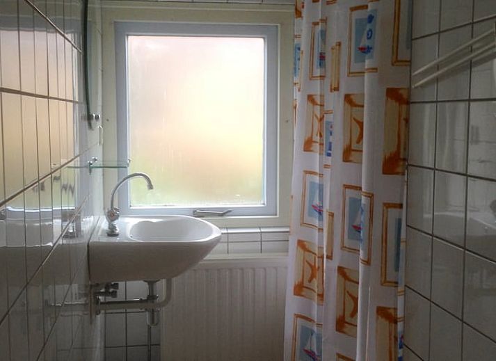 Eethoek in Huisje in Zuidwolde, vakantiehuis in Zuidwolde met uitzicht op de tuin.