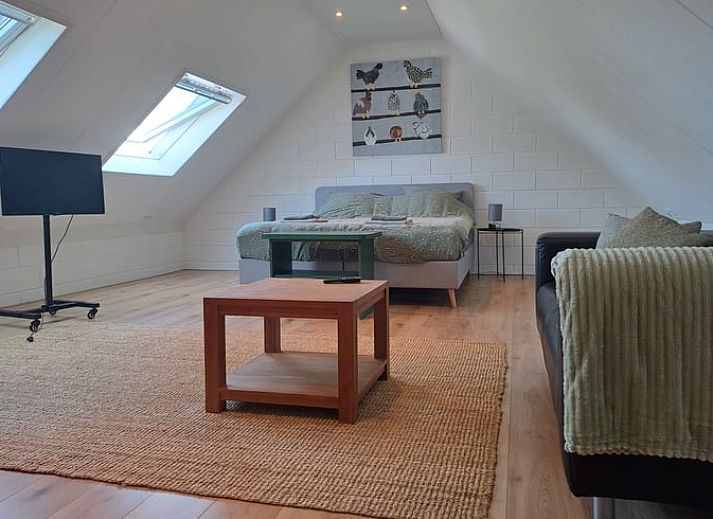 Vakantiehuis in Zuidwolde met charmante houten gevel, gelegen in het schilderachtige Zuidwest Drenthe voor een rustgevend verblijf.