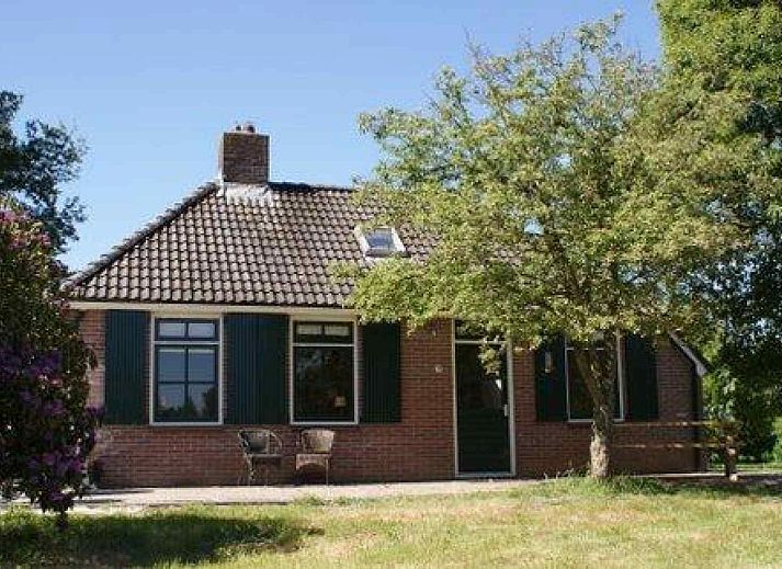 Vakantiehuis DG1377 in Zuidwolde, Drenthe, omgeven door groene natuur en rustieke charme.