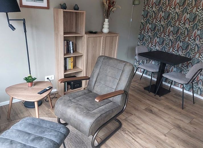 Gemuetliche Sitzecke auf der Terrasse des Ferienhauses in Zuidwolde, Suedwest-Drenthe.