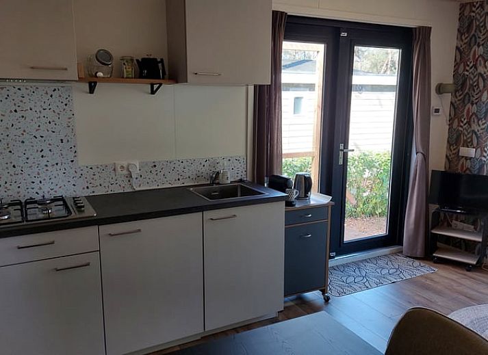 Gemuetliche Sitzecke auf der Terrasse des Ferienhauses in Zuidwolde, Suedwest-Drenthe.