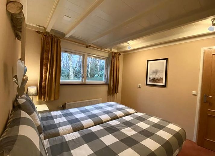 Vakantiehuisje in Ruinen, Zuidwest Drenthe, omgeven door weelderige natuur en rustgevende bossen.