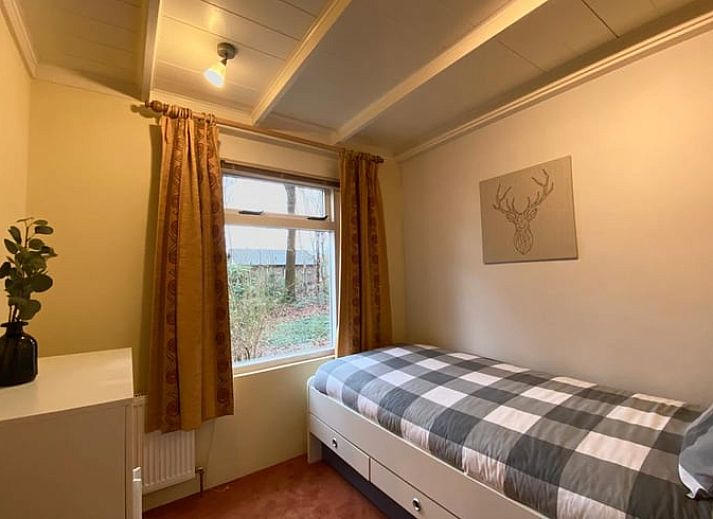 Gezellige woonkamer van Vakantiehuisje in Ruinen, Zuidwest Drenthe, met comfortabele zitplaatsen en veel licht.