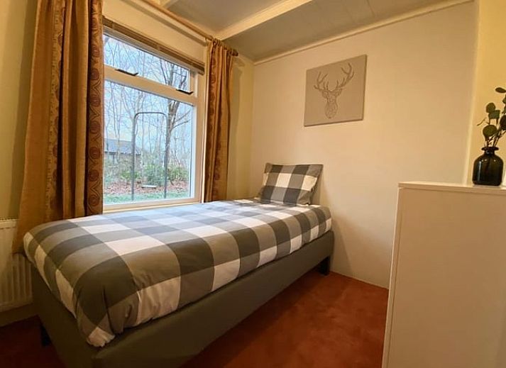 Gezellige woonkamer van Vakantiehuisje in Ruinen, Zuidwest Drenthe, met comfortabele zitplaatsen en veel licht.