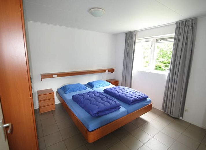 Das Ferienhaus in Ruinen, im Suedwesten von Drenthe, bietet einen ruhigen Rueckzugsort mit Terrasse und gruener Umgebung, ideal fuer Naturliebhaber.