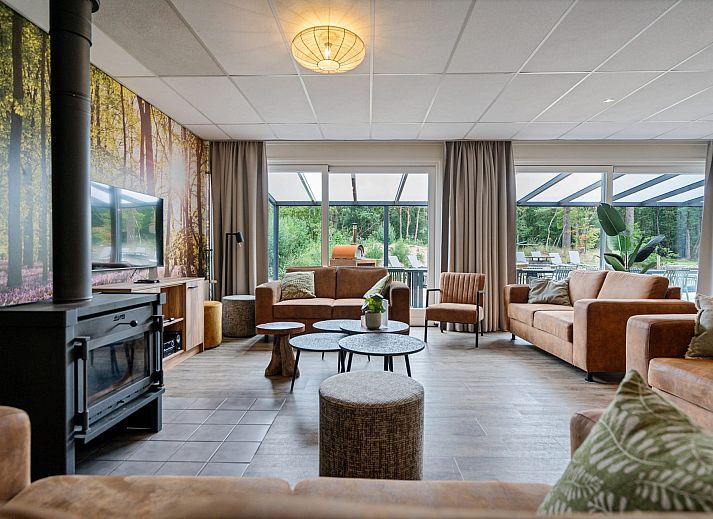 Groepsaccommodatie de Komeet in Dwingeloo biedt een ruim vakantiehuis met terras en uitzicht op de natuur in Zuidwest Drenthe.