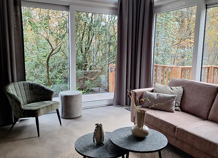 Entspannen Sie sich in der Sauna von Chalet Aurora, einem Ferienhaus in Dwingeloo, Suedwest-Drenthe, umgeben von gruener Natur.