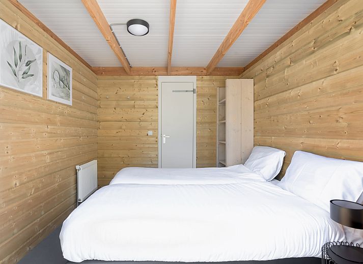 Enjoy the natural surroundings on the spacious terrace of Heidelodge, a vacation home in Dwingeloo, Southwest Drenthe.