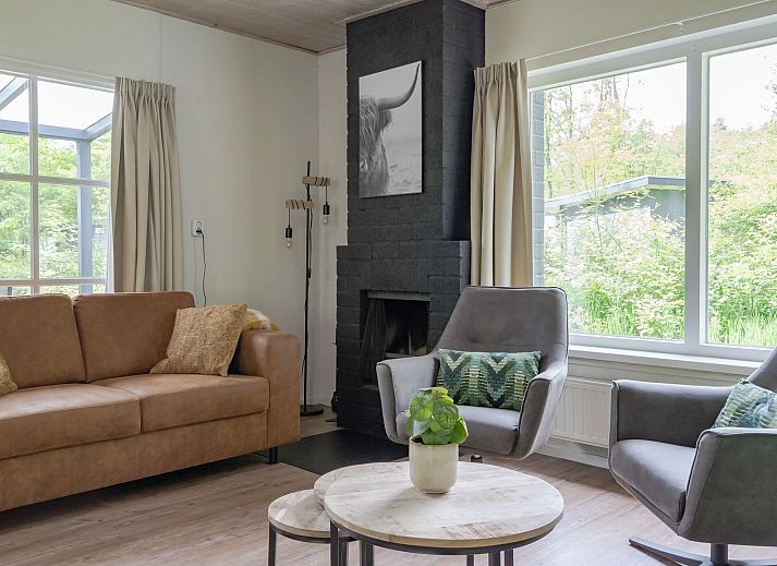 Bungalow Saturnus in Dwingeloo, Zuidwest Drenthe. Geniet van het terras en de natuurlijke omgeving van dit vakantiehuis.