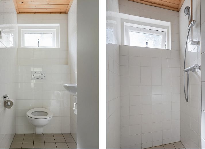 Gezellige binnenruimte van Bungalow Saturnus in Dwingeloo, Drenthe, met moderne keuken en eetruimte voor een ontspannen vakantieverblijf.