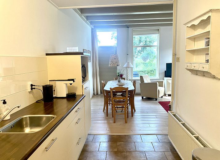 Geniet van de serene tuin en groene omgeving van vakantiehuis DG2051 in Ruinerwold, Zuidwest Drenthe, perfect voor natuurliefhebbers.