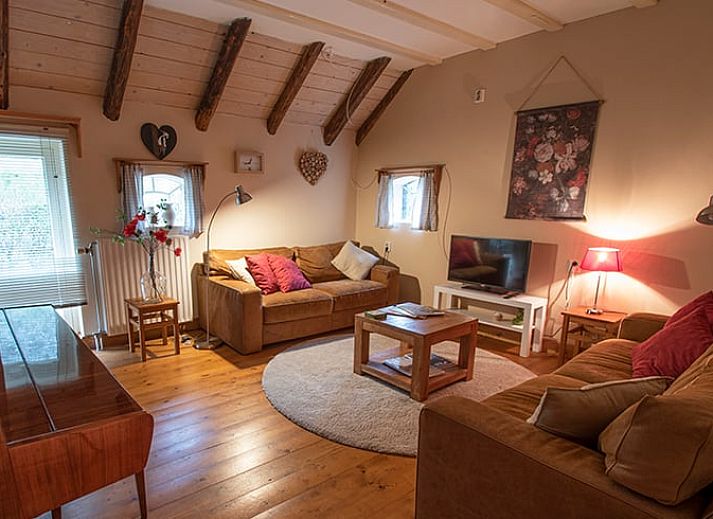 Ferienhaus in Ruinerwold, ein charmantes Ferienhaus in Suedwest-Drenthe mit grossem Innenhof und charakteristischer Architektur.