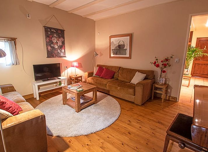 Ferienhaus in Ruinerwold, ein charmantes Ferienhaus in Suedwest-Drenthe mit grossem Innenhof und charakteristischer Architektur.