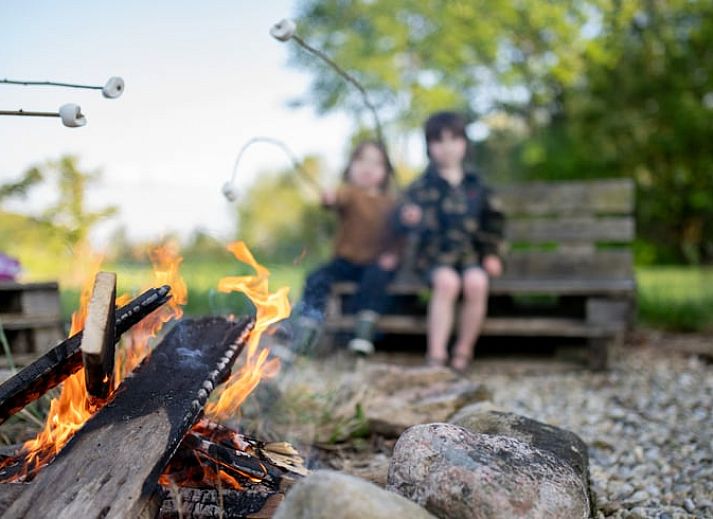 Kaminofen und Kuschelecke im Cottage in Vledder, Ferienhaus in Suedwest-Drenthe.