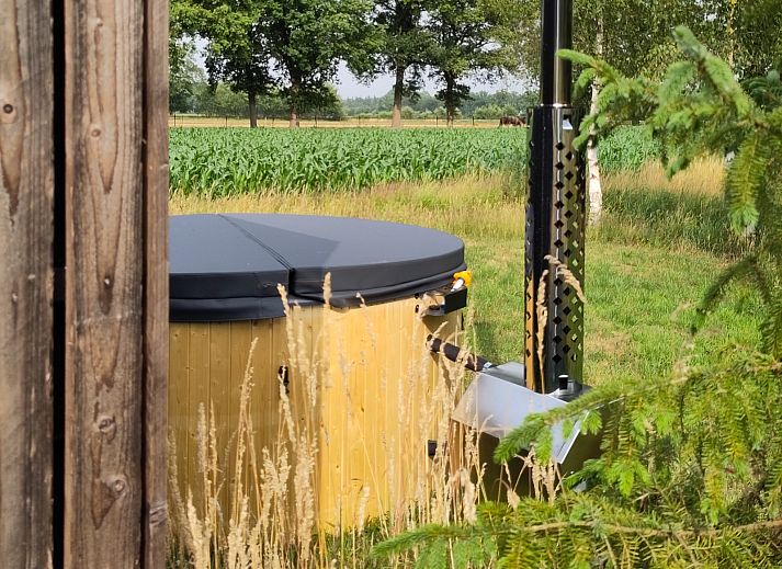 Vakantiehuis DG1834 in Vledder, Zuidwest Drenthe, omgeven door groene natuur en rust.