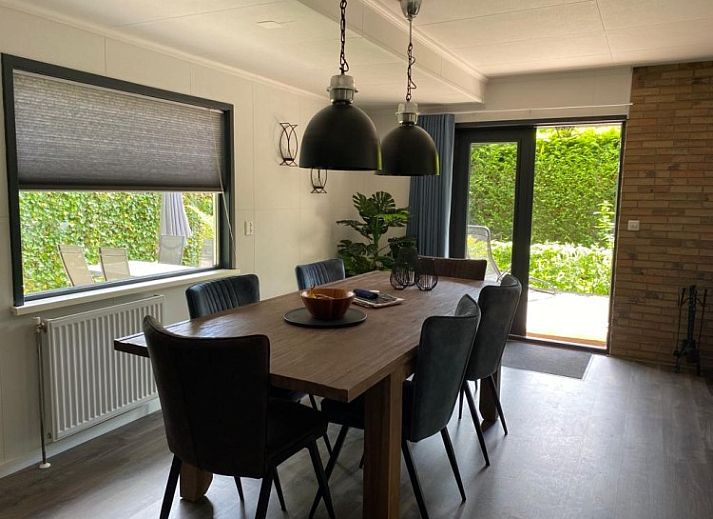 Cozy porch of Cottage 54 in Wateren, Southwest Drenthe, perfect for relaxing outdoor seating.